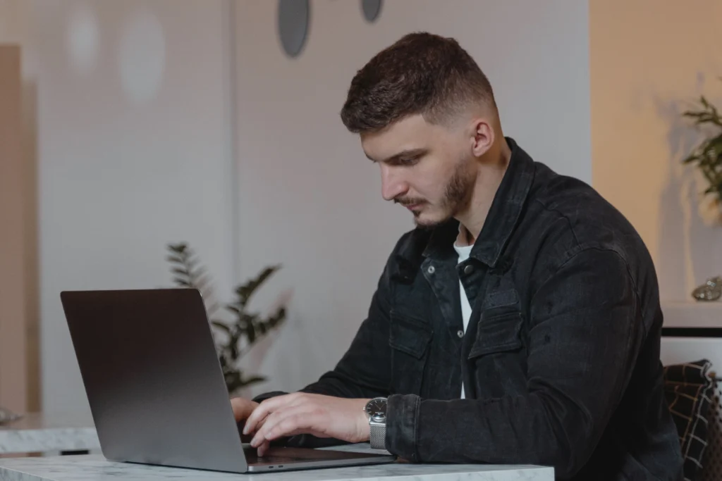 seo-professional-typing-on-his-laptop